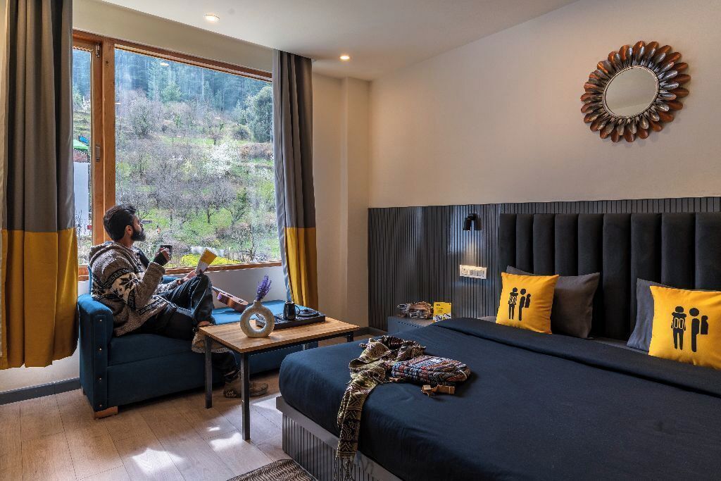 Deluxe dubbelrum - utsikt mot bergen | Strykjärn/strykbräda, gratis wi-fi och sängkläder