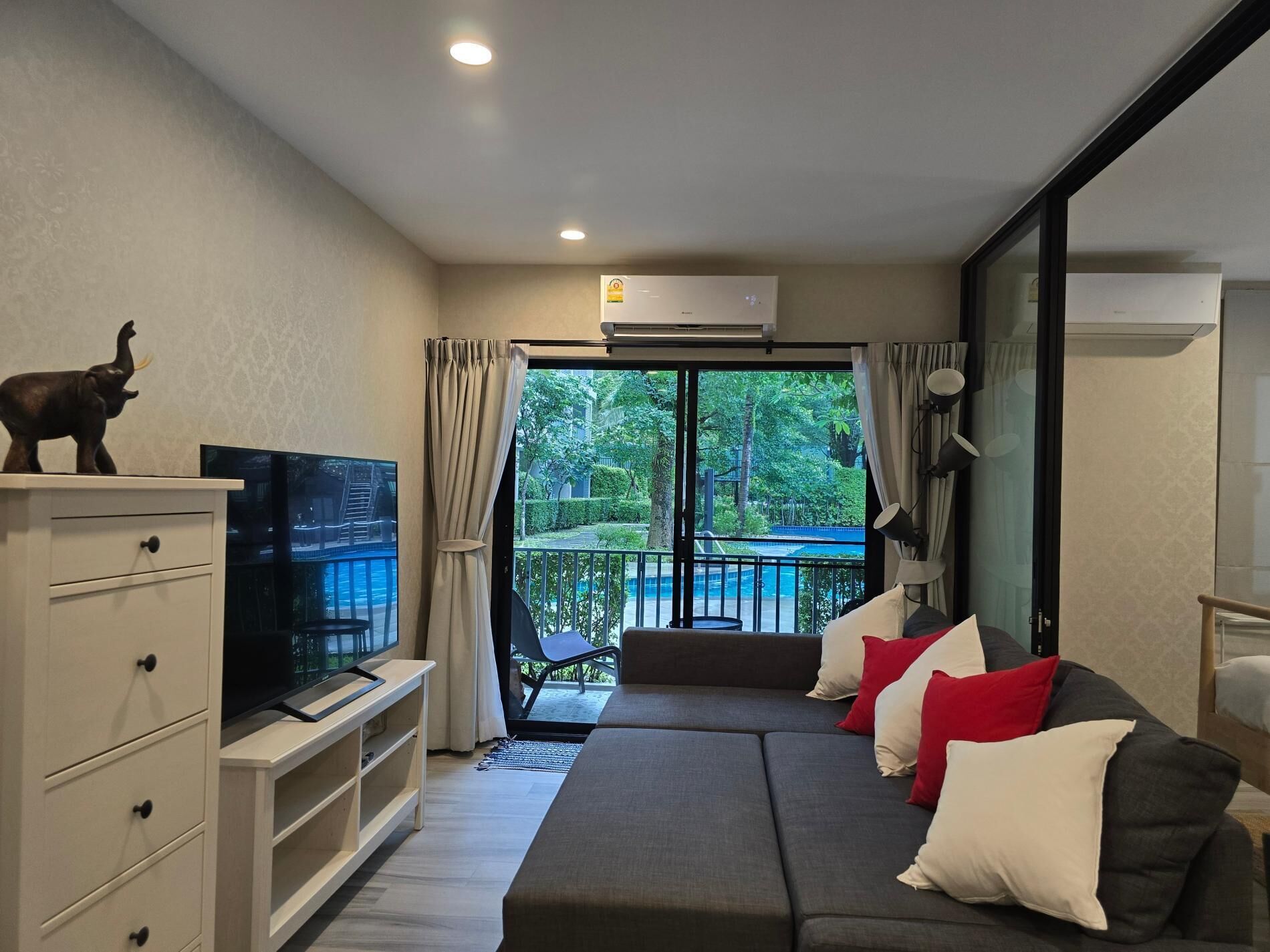 Apartment, Balcony, Pool View | Living area