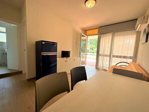 Apartment, 2 Bedrooms, Balcony, City View | Dining room - Apartment With Private Entrance in Bibione (San Michele al Tagliamento)