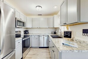 Fridge, microwave, oven, stovetop - Waterfront home with, private grill, and washer and dryer, and Gulf access (Fort Myers Beach)