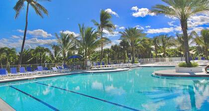 Beautiful 2 BR Condo - Oceanfront Community - Golf Course - Resort Pool w/ Tiki Bar