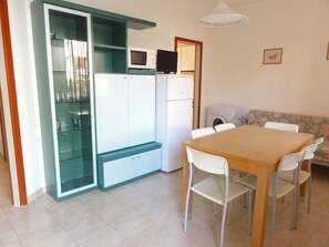 Apartment, 3 Bedrooms, Patio, Garden View | Dining room - Apartment in a House With Garden (San Michele al Tagliamento)