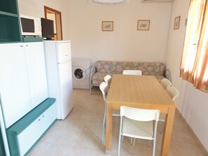 Appartement, 3 slaapkamers, terras, uitzicht op tuin | Dineerruimte