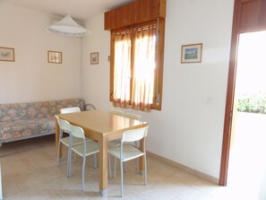 Apartment, 3 Bedrooms, Patio, Garden View | Dining room - Apartment in a House With Garden (San Michele al Tagliamento)