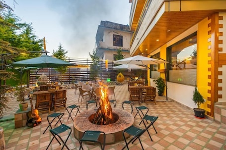 Living area. The Hosteller Mcleodganj, Bhagsu Waterfall