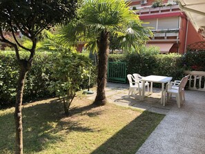 Apartment, 2 Bedrooms, Patio, Garden View | Garden - Apartment With Pool Access Near Beach (San Michele al Tagliamento)