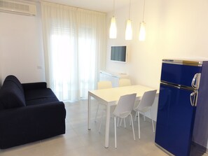 Apartment, 1 Bedroom, Balcony, Ocean View | Dining room - Modern Flat With sea View (San Michele al Tagliamento)
