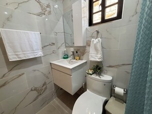 Dutxa, tovalloles, sabó i paper higiènic 