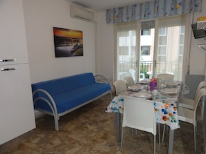 Apartment, 3 Bedrooms, Balcony | Dining room - Flat in a Modern Coastal Building (San Michele al Tagliamento)