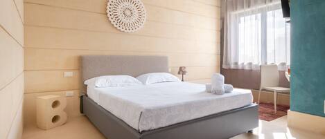 1 slaapkamer, een strijkplank/strijkijzer, wifi, beddengoed