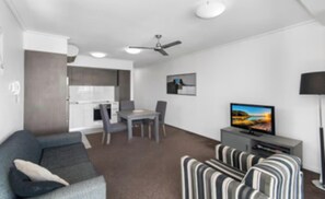 Apartment, 1 Bedroom, Accessible, Smoking | Living room | Books - City Convenience in Modern Townsville Apartment (Townsville)