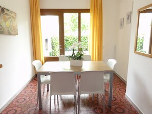 Apartment, 2 Bedrooms, Patio, Garden View | Dining room - Apartment in a Villa With Private Garden (San Michele al Tagliamento)