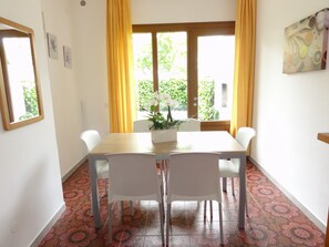 Apartment, 2 Bedrooms, Balcony, Garden View | Dining room - Flat in a Villa With Garden (San Michele al Tagliamento)