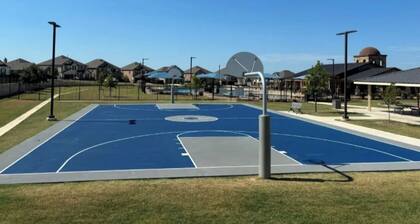 Charming Modern Brick Home with Spacious Porch & Family Comforts