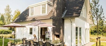 Spacious 10-person Villa in Quiet Holiday Park