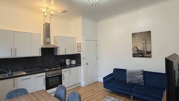 Apartment, 1 Bedroom | Dining room