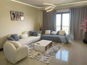 Living area - Unique duplex hotel apartment pool view (New Cairo City)