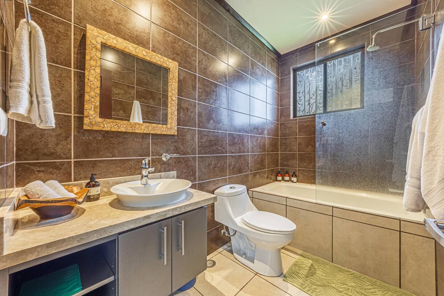 Shower, eco-friendly toiletries, hair dryer, towels