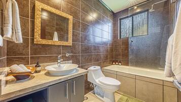 Shower, eco-friendly toiletries, hair dryer, towels