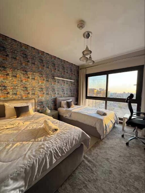 2 habitaciones, tabla de planchar con plancha, wifi y ropa de cama 