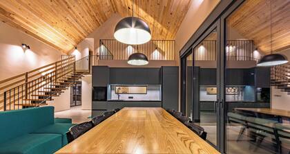 Blacksmith House - Stylish vacation home with spa & nature views