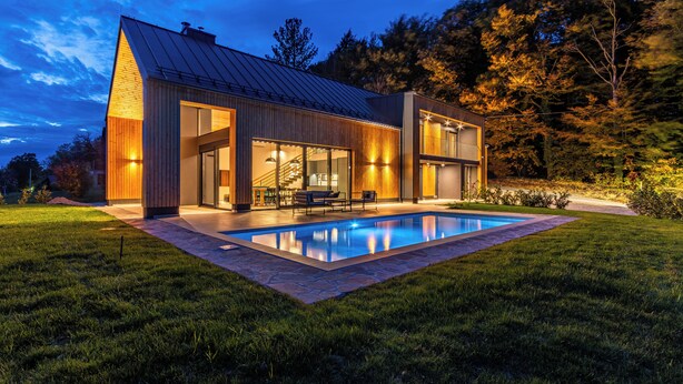 A modern two-story house with a swimming pool, large windows, and a well-maintained lawn. - Blacksmith House - Stylish vacation home with spa & nature views (Varaždinske Toplice)