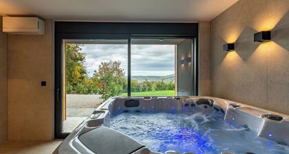 Blacksmith House - Stylish vacation home with spa & nature views