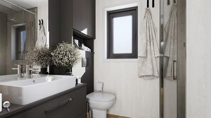 Douche, sèche-cheveux, serviettes fournies