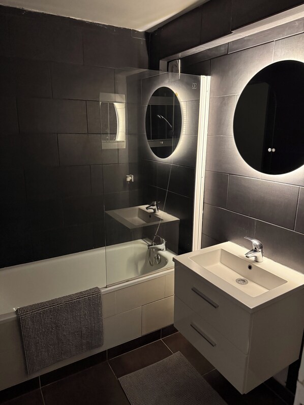 Hair dryer, bidet, towels, soap
