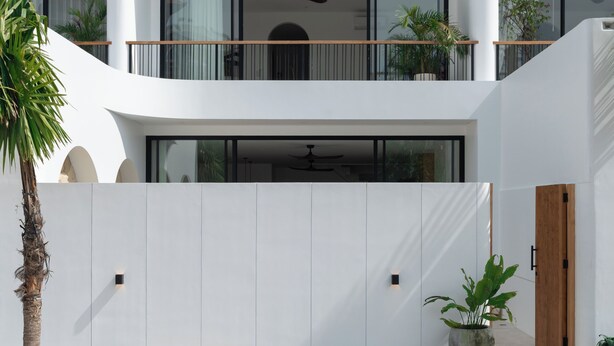 A modern two-story house with a flat roof, large windows, and a balcony. - Elements Villa A2 - Dreamland (South Kuta)