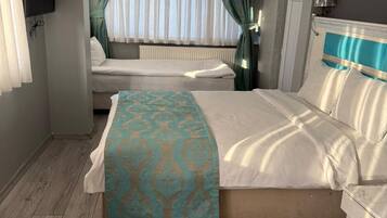 Cortinas blackout, ferros/tábuas de passar roupa, Wi-Fi de cortesia