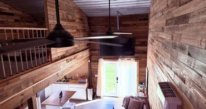 Charming and quiet 1-bedroom loft barndominium on 12 acres with RV hookups