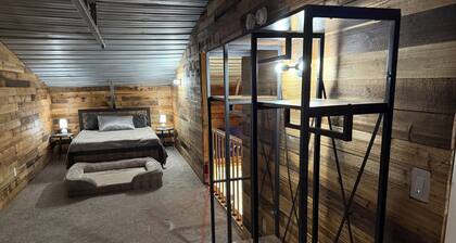 Charming and quiet 1-bedroom loft barndominium on 12 acres with RV hookups