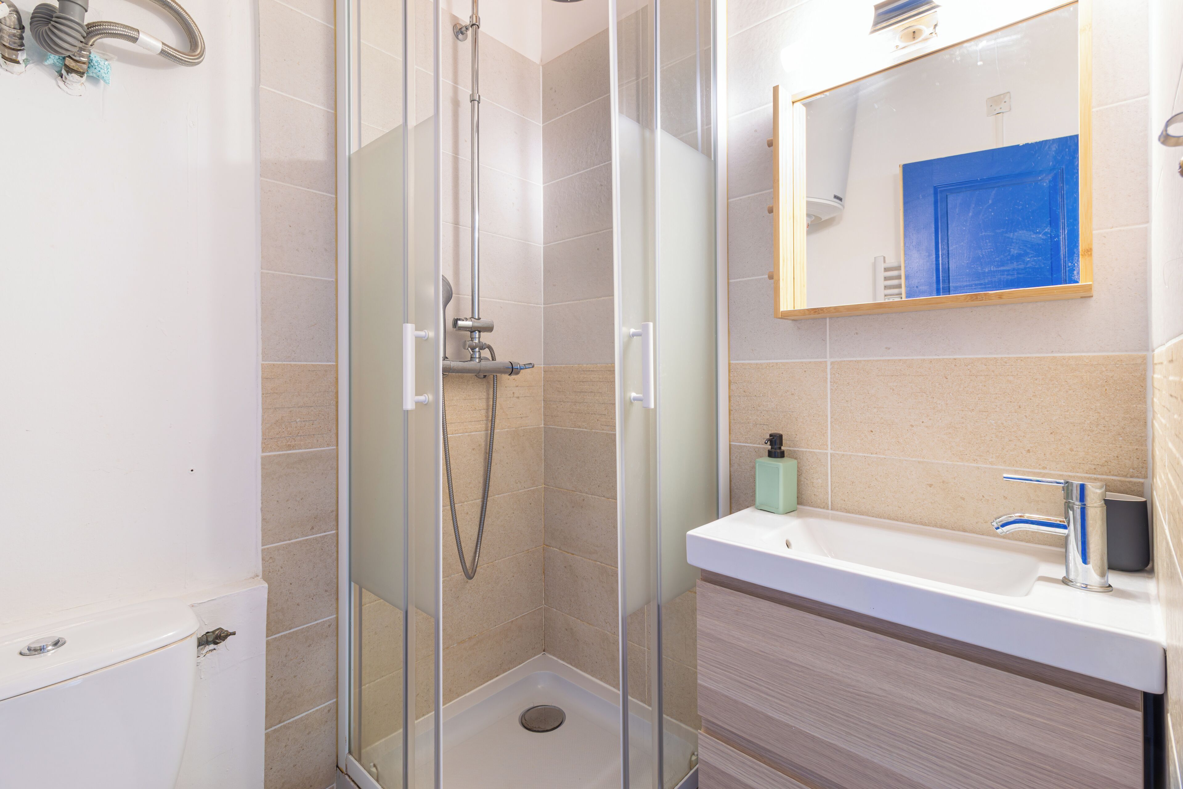 Shower, hair dryer, towels, soap