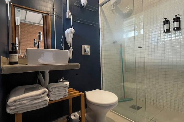 Superior Triple Room, Balcony | Bathroom | Shower, free toiletries, hair dryer, towels