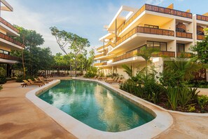 Outdoor pool, open 9:00 AM to 10:00 PM, sun loungers