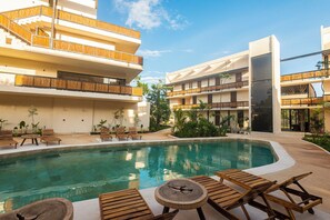 Outdoor pool, open 9:00 AM to 10:00 PM, sun loungers