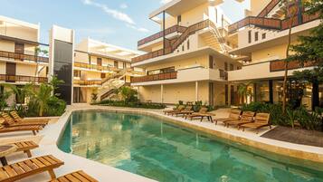 Outdoor pool, open 9:00 AM to 10:00 PM, sun loungers