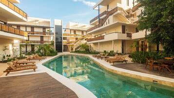 Outdoor pool, open 9:00 AM to 10:00 PM, sun loungers