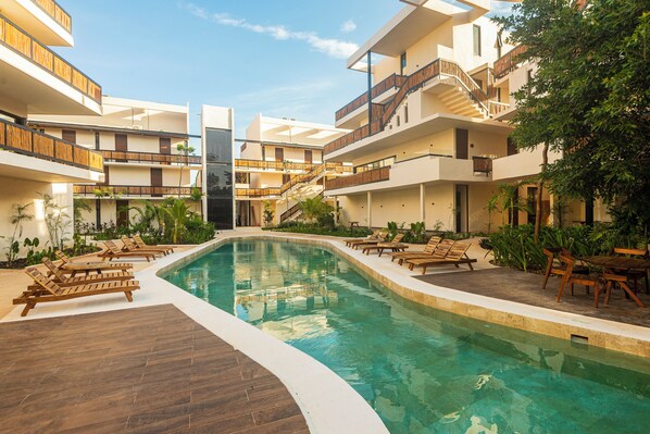 Outdoor pool, open 9:00 AM to 10:00 PM, sun loungers