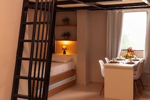 Desk, laptop workspace, free WiFi, bed sheets