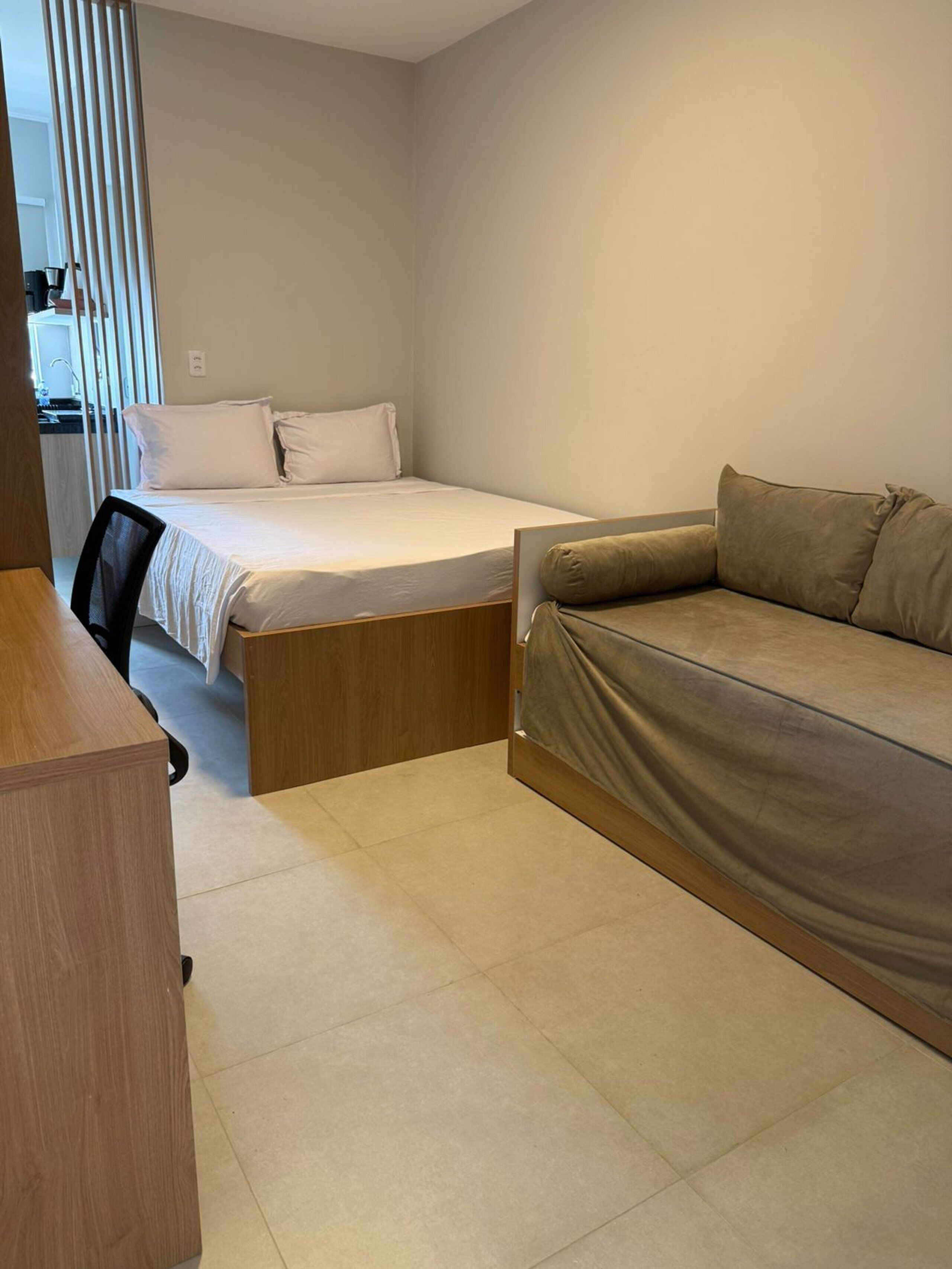 Desk, laptop workspace, free WiFi, bed sheets