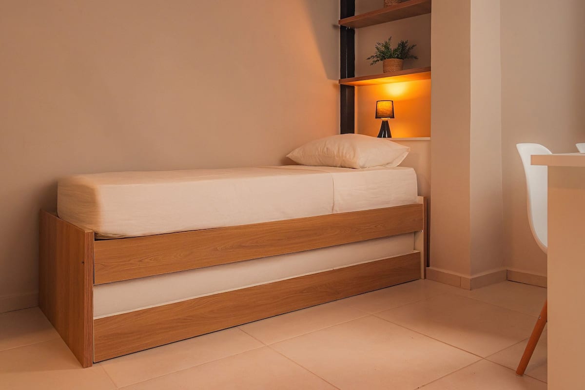 Desk, laptop workspace, free WiFi, bed sheets