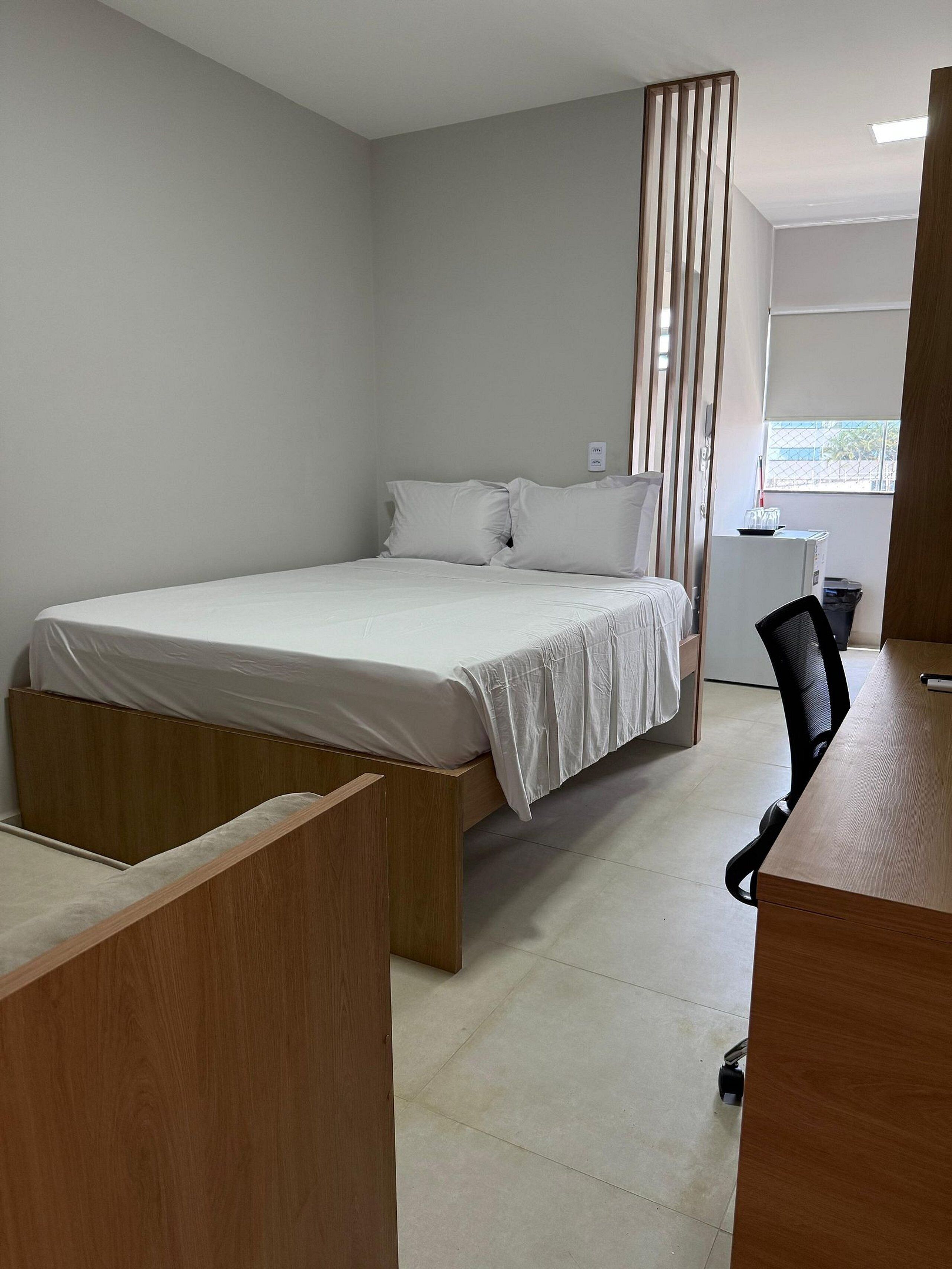 Desk, laptop workspace, free WiFi, bed sheets