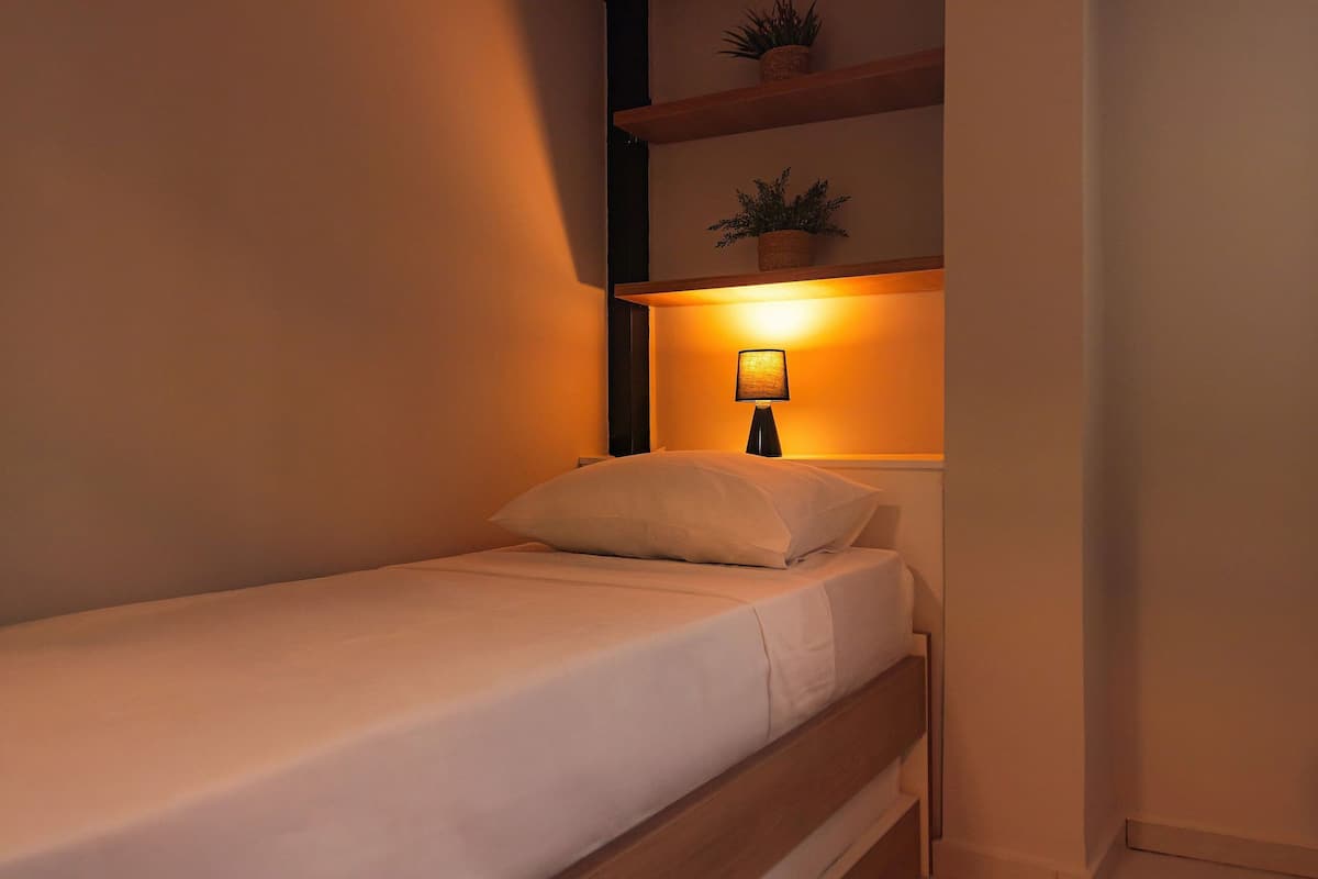 Desk, laptop workspace, free WiFi, bed sheets