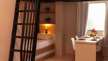 Desk, laptop workspace, free WiFi, bed sheets