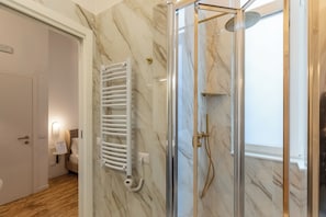 Shower, free toiletries, hair dryer, towels