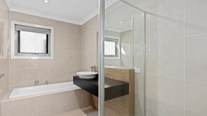 Shower, hair dryer, towels