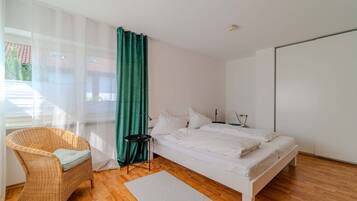 Desk, iron/ironing board, travel cot, free WiFi