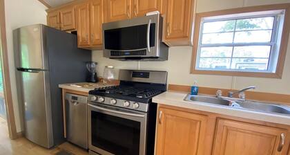 ROOMY PARK MODEL HOME WITH PRIVATE BEDROOM WITH QUEEN SIZE BED, FULL KITCHEN AND BATHROOM, LIVING ROOM WITH PULL-OUT QUEEN-SIZE BED IN COUCH. HAS COVERED PARKING & A DECK, WITH SHED. MONTHLY RATE IS $1,400, BUT PLEASE CALL FOR AVAILABILITY.